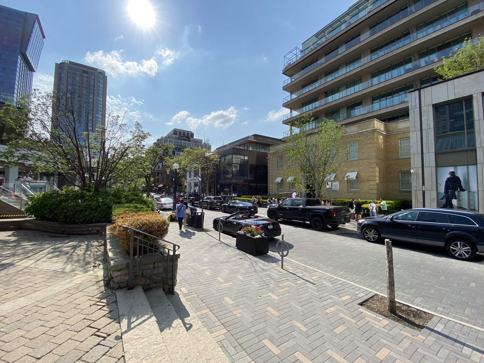 Yorkville Avenue streetscape view with luxury retail and residential backdrop in Toronto; neighbourhood context, not the subject building